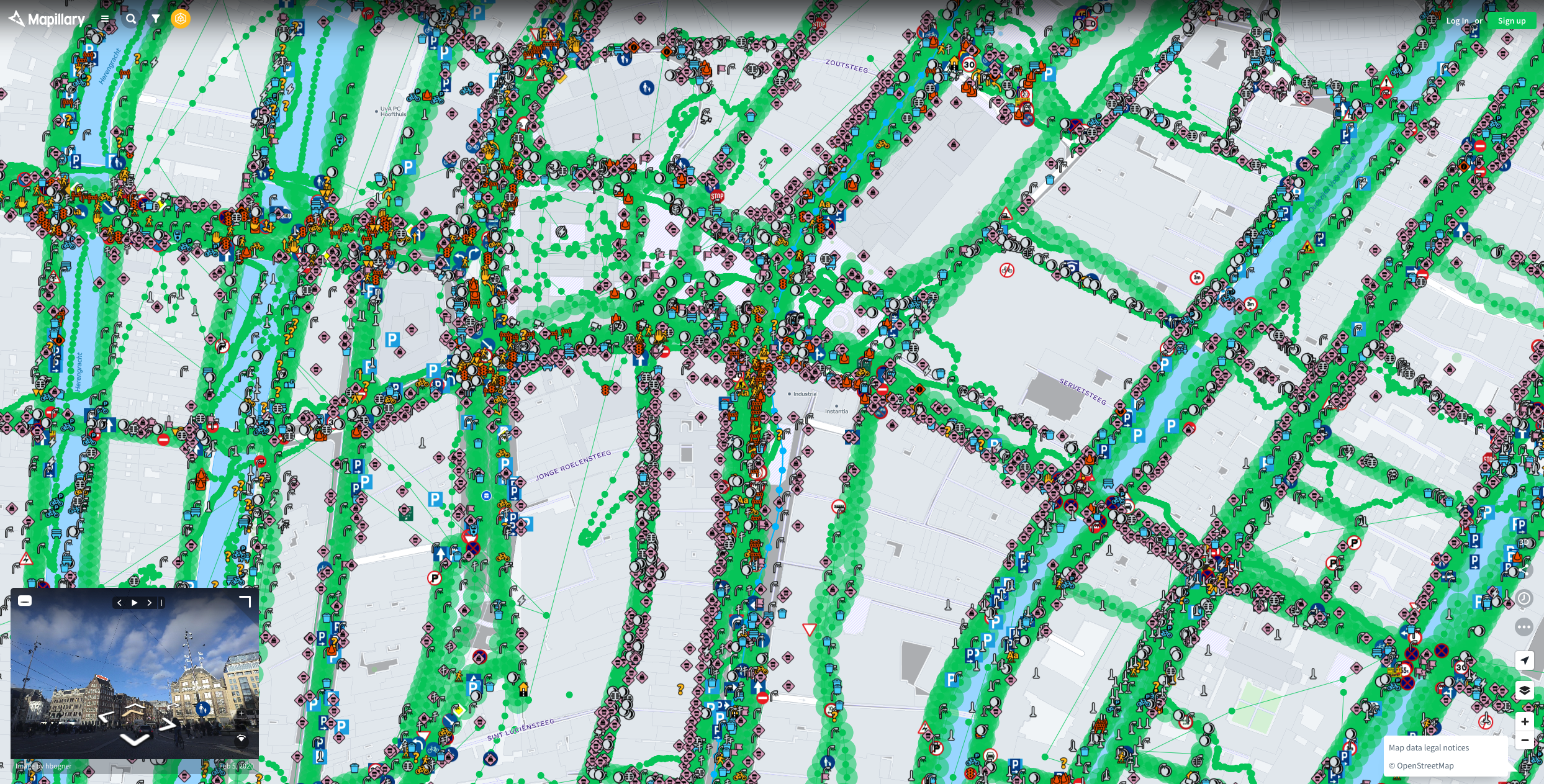 Screenshot of a search for street level imagery in Amsterdam with Mapillary shows a map with individual markers as dots on the map where street level imagery exists..